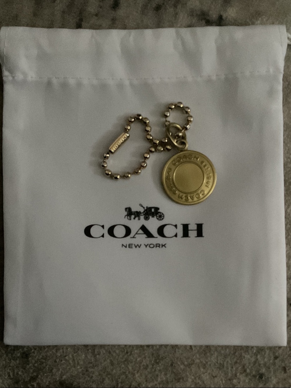 COACH Gold-Tone Round Token Charm with coach ball chain